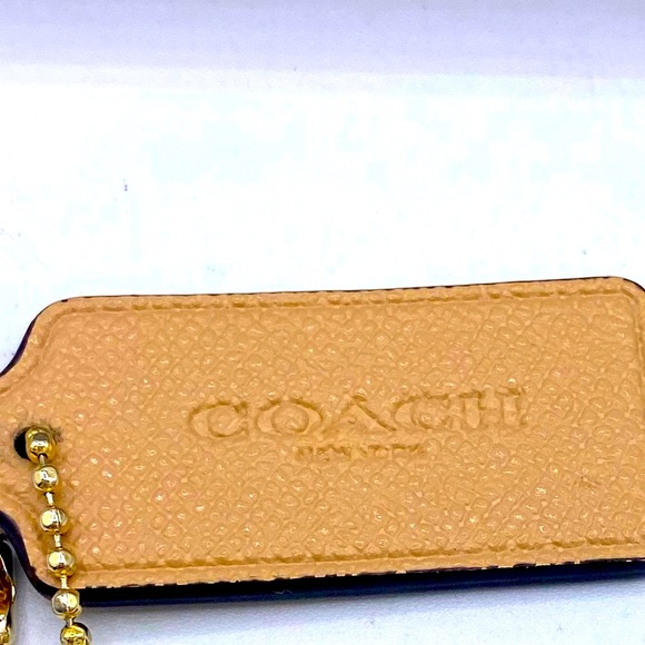 Coach Two Keychains A Gold One And Tan One Coach New York Is On The Front - Picture 3 of 5